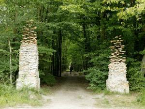 Cornelia Konrads. The gate, 2004 stones, iron, cement. 3.5 high x 5 m long x 0.8 m wide. Fontainebleau (France). www.cokonrads.de