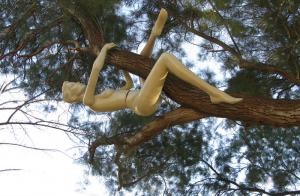 Back to the Trees", 2009. Tree, Plastic mannequin. 60x150x100 cm. The Green gallery, Israel.