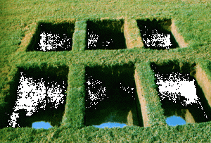 "Window into Another World". 1989. Soil, grass, mirror. 90x500x300 cm. Givat-Brener, Israel.