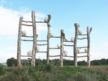 Gila Croker, "Nature's Music", 2008. Wood, stones (boulders).